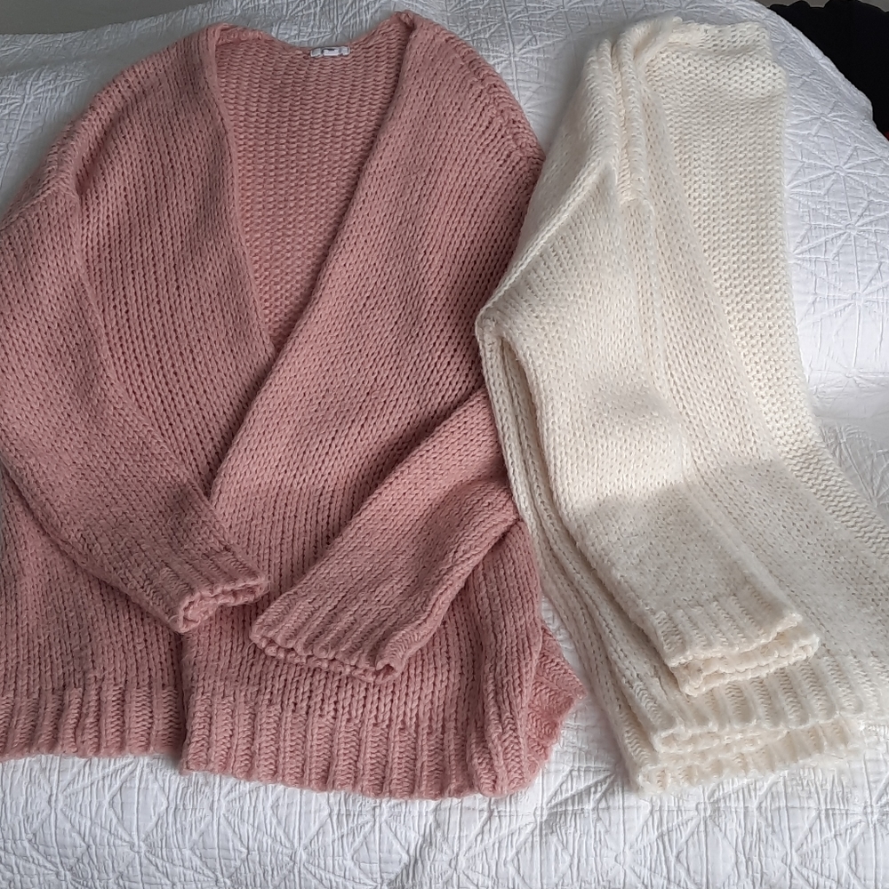 Pink and white chunky knit sweaters